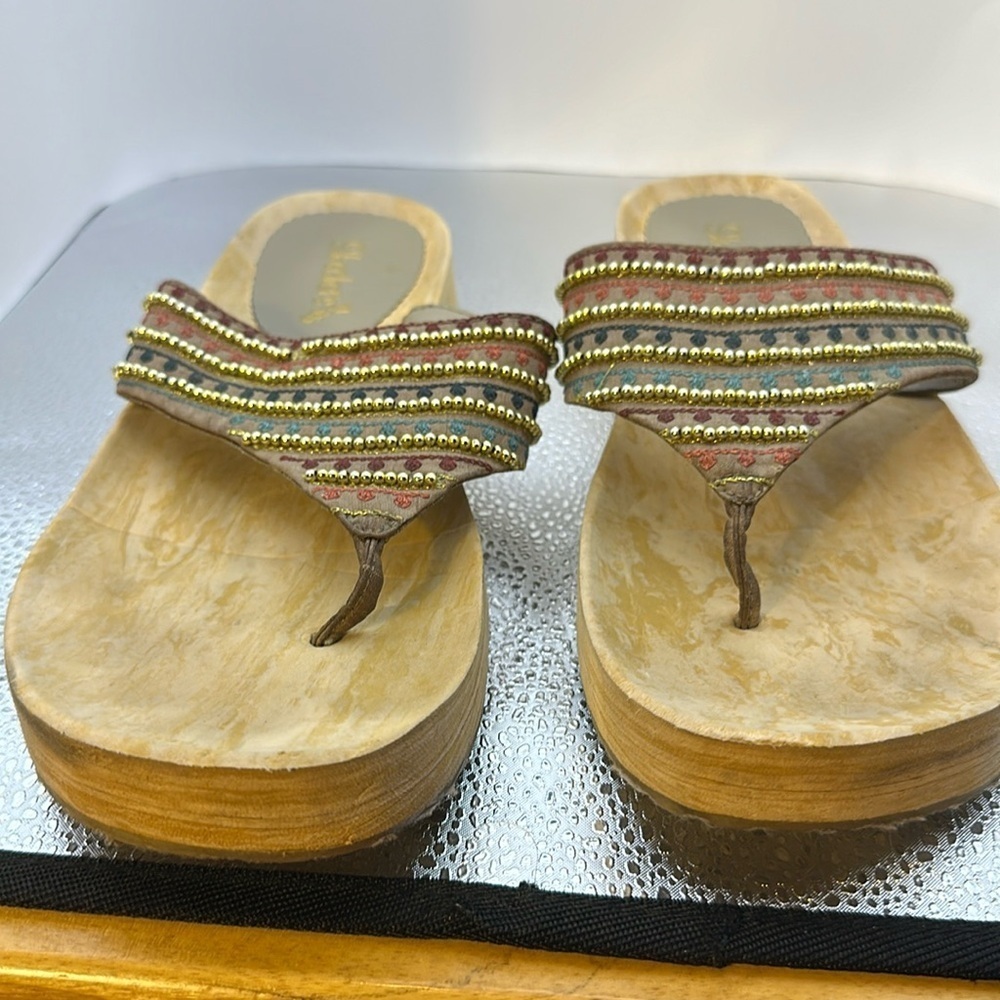 Sketchers sandals, size 10. They are gorgeous with gold beading. Excellent.Cond‍